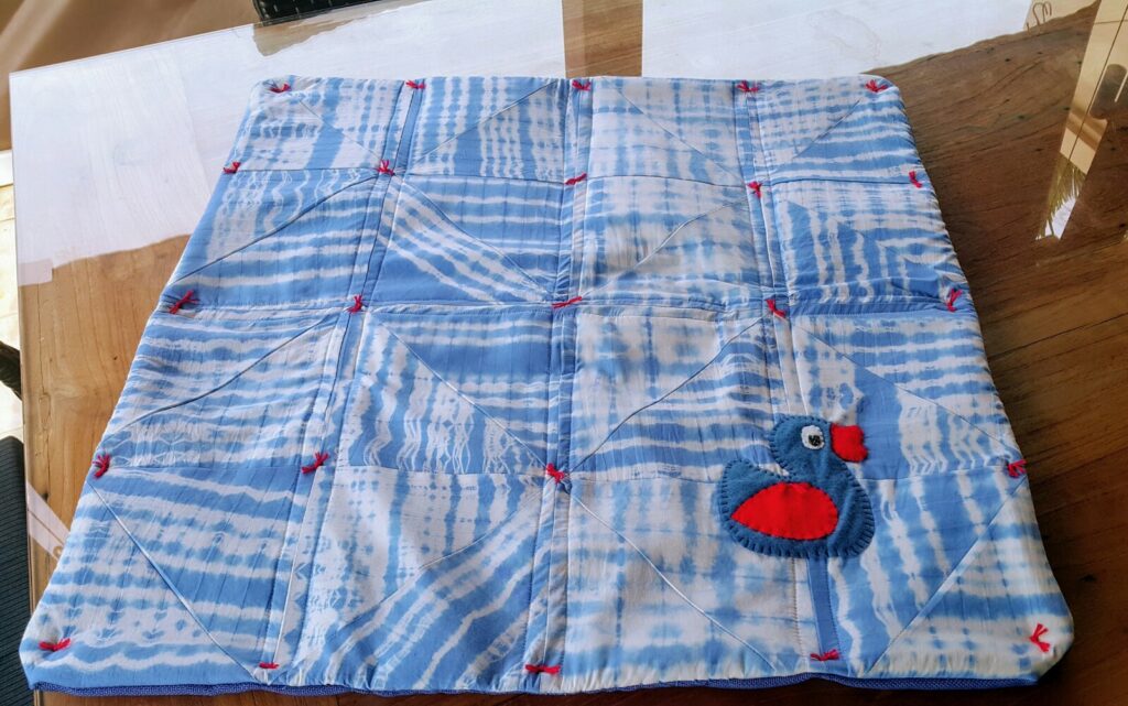 Baby Pad made from recycled bed sheets and tie-dye