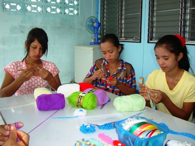 Women learning to crochet